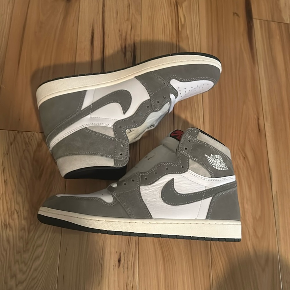 Authentic men’s grey and white air Jordan high.